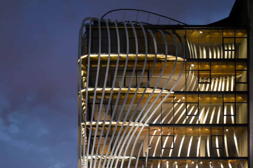 Aluminium strips curve through Mexico City building by Belzberg