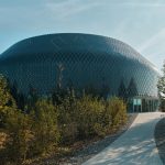 Novartis Pavillon zero-energy media facade features a total of 10,000 diamond-shaped solar modules