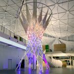 Eddy and Shroud explore a multi-tiered canopy system with a staircase and enclosed spaces, supported by columns