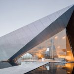 Ark of Light City Exhibition Hall features an antigravity atmosphere with perforated aluminum panels