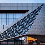 Bishan Cultural and Art Center characterizes by glass triangle planes with metallic plates