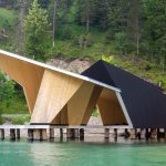 RAUMSchiff, a boathouse blending perfectly with the surrounding environment