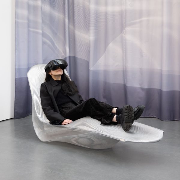 Lshaped Xchair features 3dprinted curvy lines that coalesce in layers