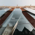 UNStudio shapes The Looking Glass with bricks, glass, and flowing curves