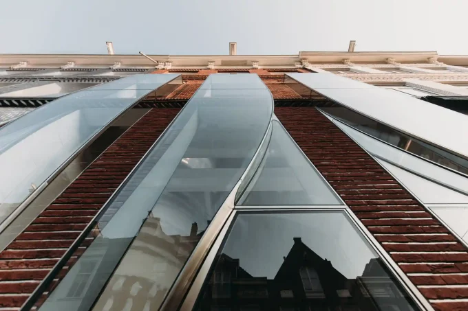 UNStudio shapes The Looking Glass with bricks, glass, and flowing curves