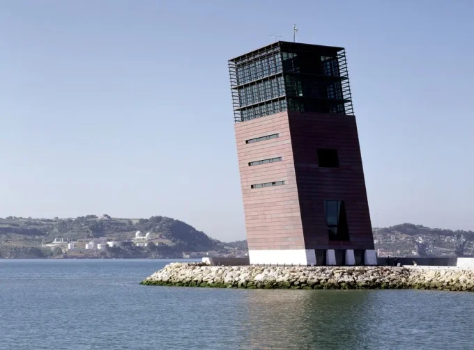 Tilting the Skyline: 8 Inclined Structures That Defy Gravity