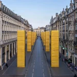SpY’s Golden Monoliths Recast Shipping Containers as Urban Totems