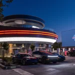 Tesla Opens First Diner Drive-In with Superchargers, Robot Servers, and Retro Design