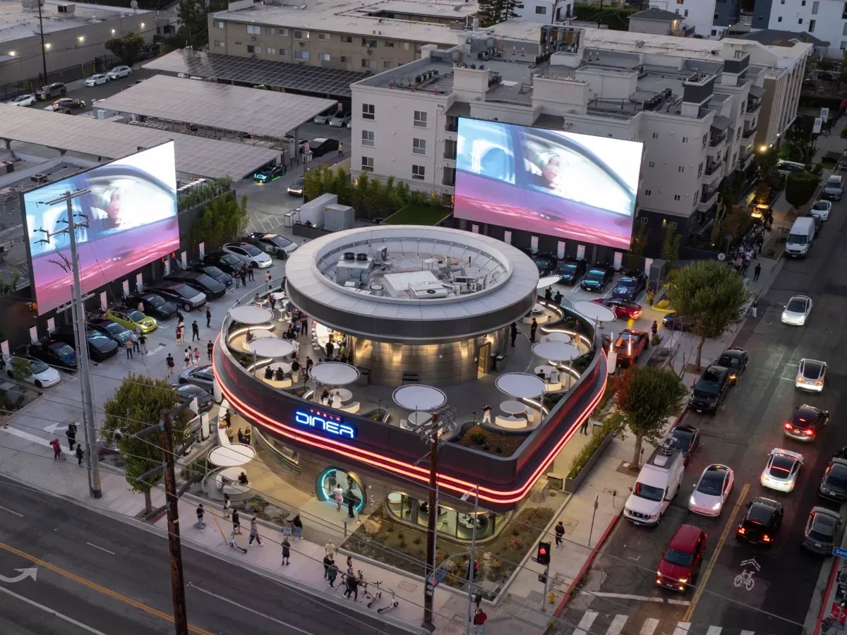 Tesla Opens First Diner Drive-In with Superchargers, Robot Servers, and Retro Design 2 Tesla Opens First Diner Drive