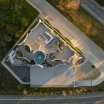 Curved Concrete Vet Hospital in Tirana by Davide Macullo Architects