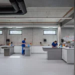 Curved Concrete Vet Hospital in Tirana by Davide Macullo Architects