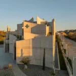 Curved Concrete Vet Hospital in Tirana by Davide Macullo Architects