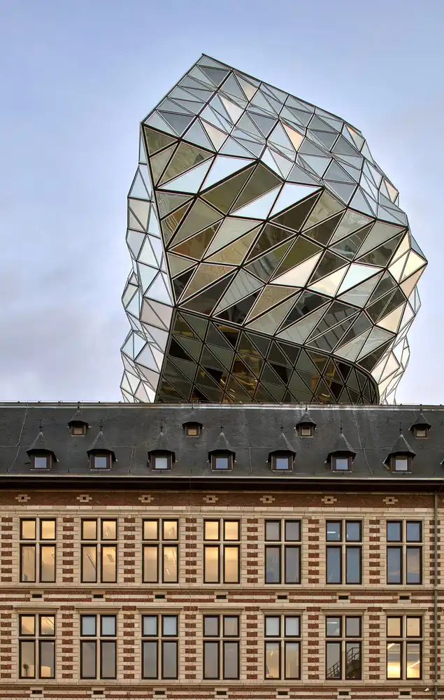 Zaha Hadid's Port House: A Floating Crystal Crown Above the City 8 Zaha Hadid's Port House