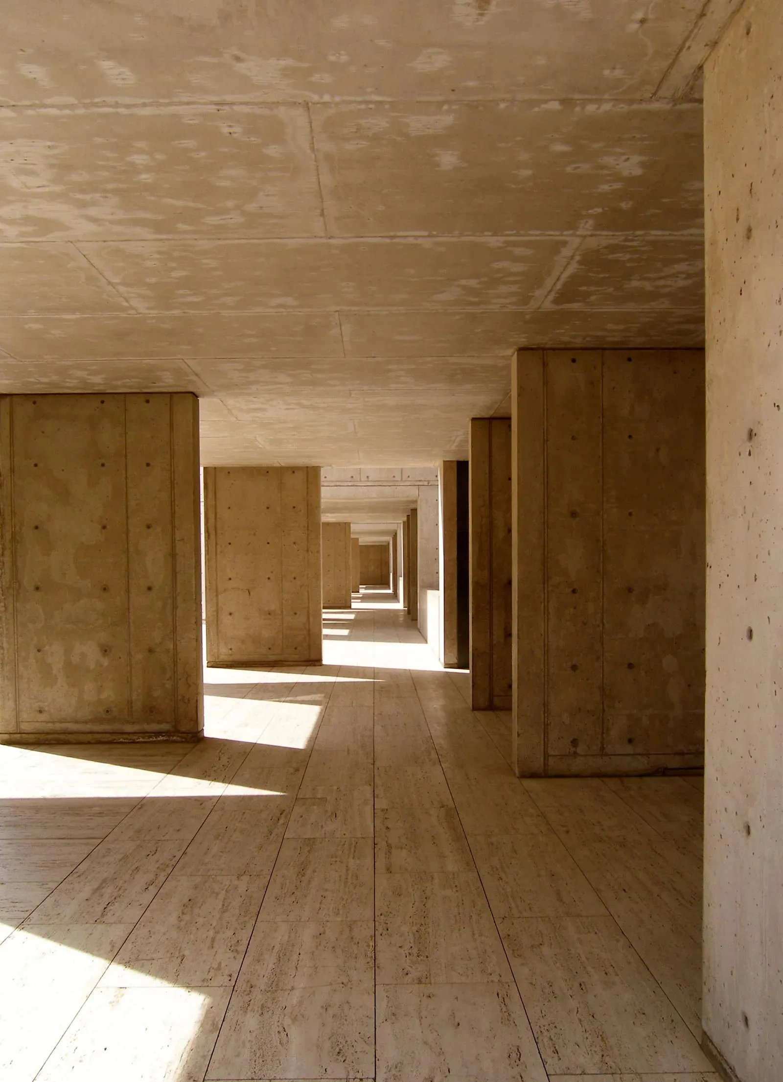 Sculpting Daylight: 10 Buildings Where Light Shapes Space 11 Salk Institute for Biological Studies, Louis Kahn, California, US