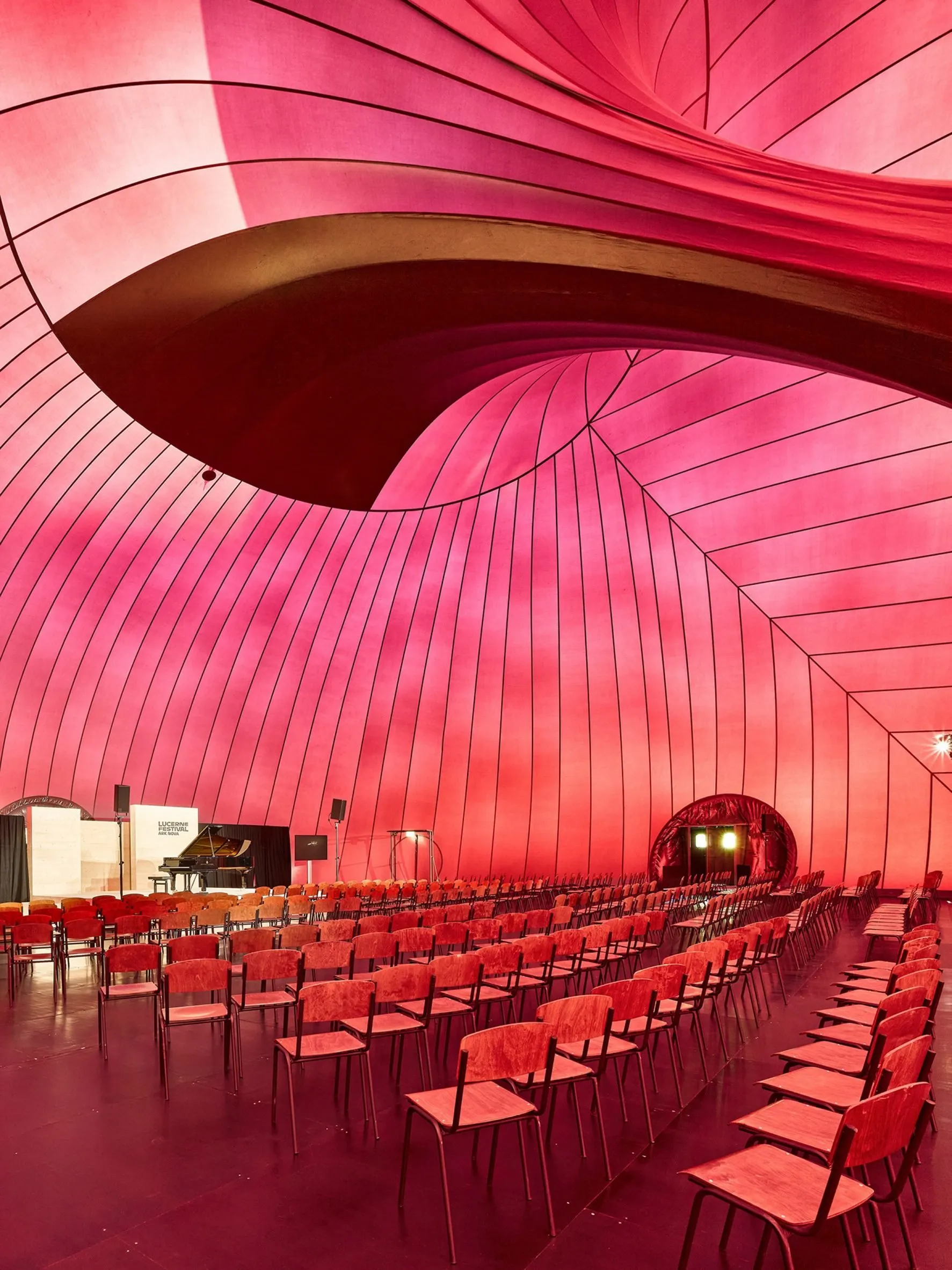 Ark Nova Inflatable Concert Hall with Plum-Colored PVC Shell at
