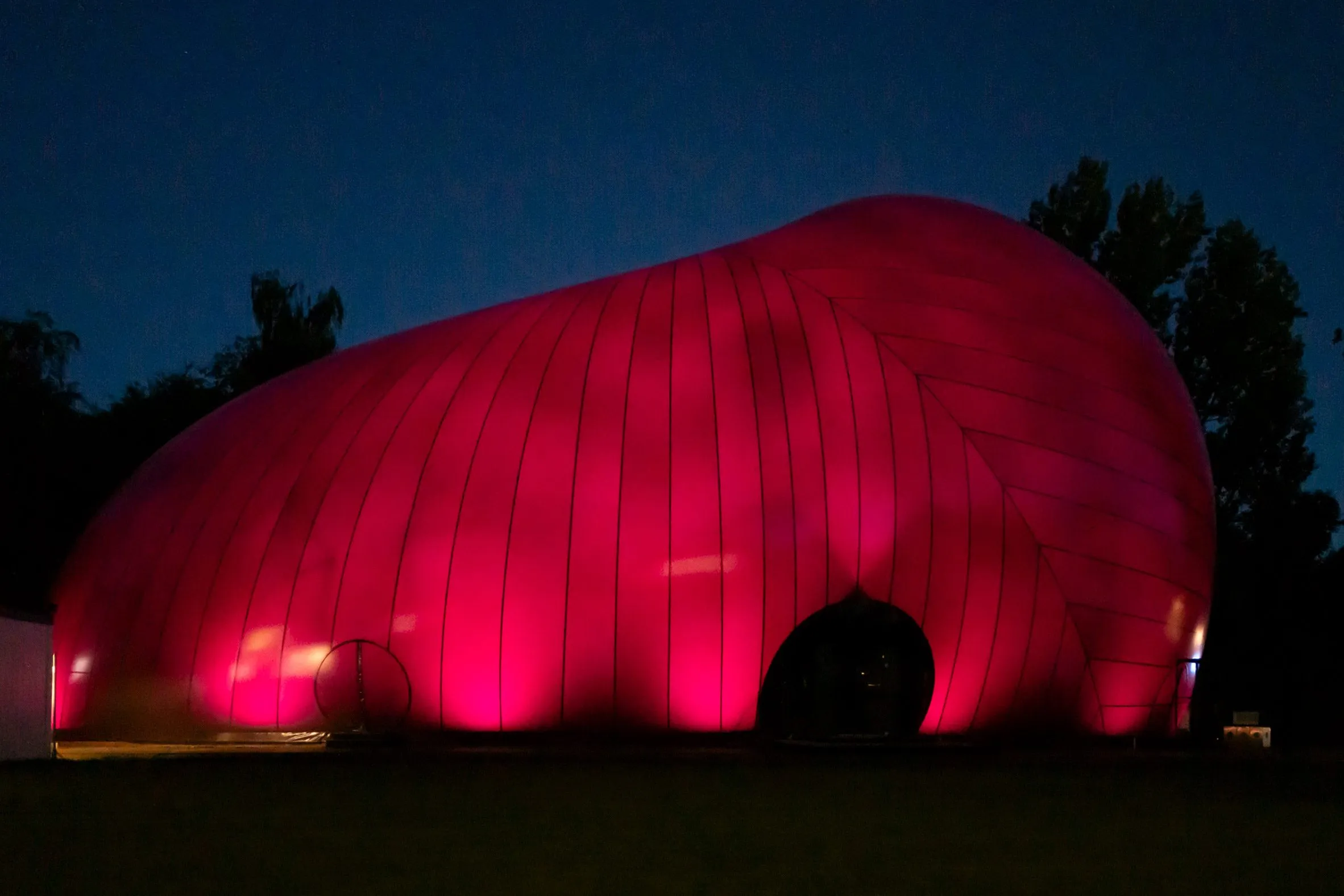 Ark Nova Inflatable Concert Hall with Plum-Colored PVC Shell at