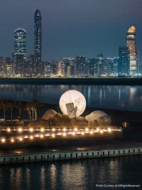 KAWS’s 32-Meter Companion Raises a Glowing Moon in Abu Dhabi