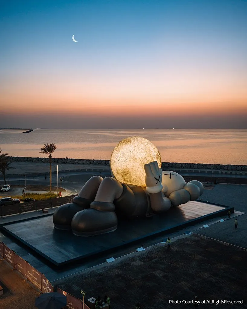 KAWS's 32-Meter Companion Raises a Glowing Moon in Abu Dhabi