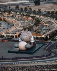 KAWS’s 32-Meter Companion Raises a Glowing Moon in Abu Dhabi