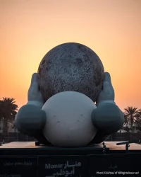KAWS’s 32-Meter Companion Raises a Glowing Moon in Abu Dhabi