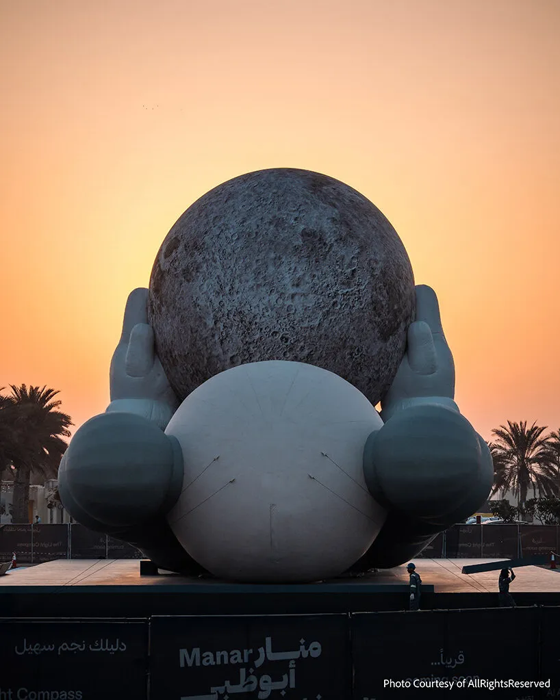 KAWS’s 32-Meter Companion Raises a Glowing Moon in Abu Dhabi 7 KAWS’s 32-Meter Companion Raises a Glowing Moon in Abu Dhabi