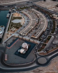 KAWS’s 32-Meter Companion Raises a Glowing Moon in Abu Dhabi