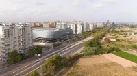 The Ceramic-Skinned Roig Arena by HOK and ERRE Arquitectura
