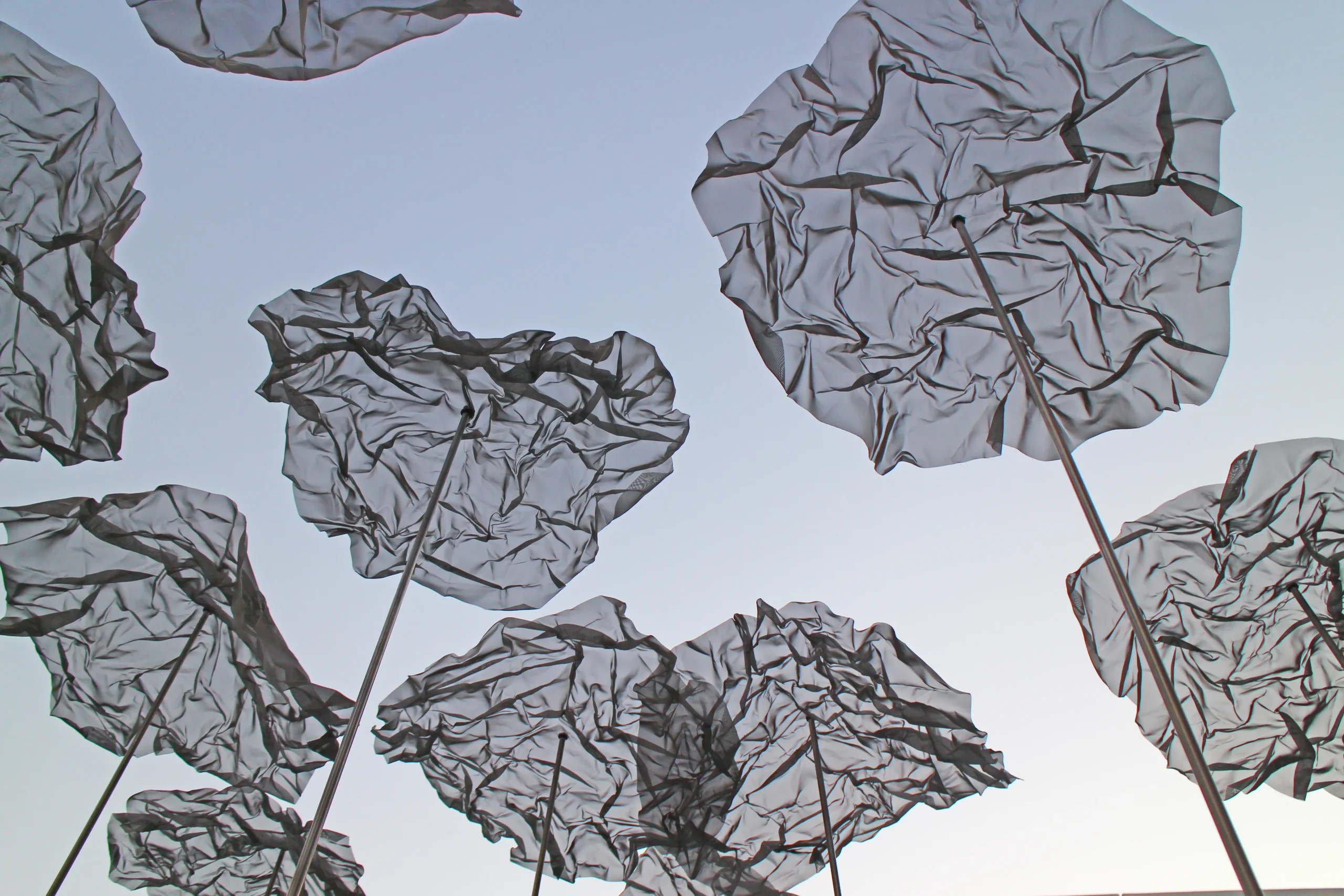 YOKOMAE et BOUAYAD’s stainless-steel pavilion at Louvre Abu Dhabi