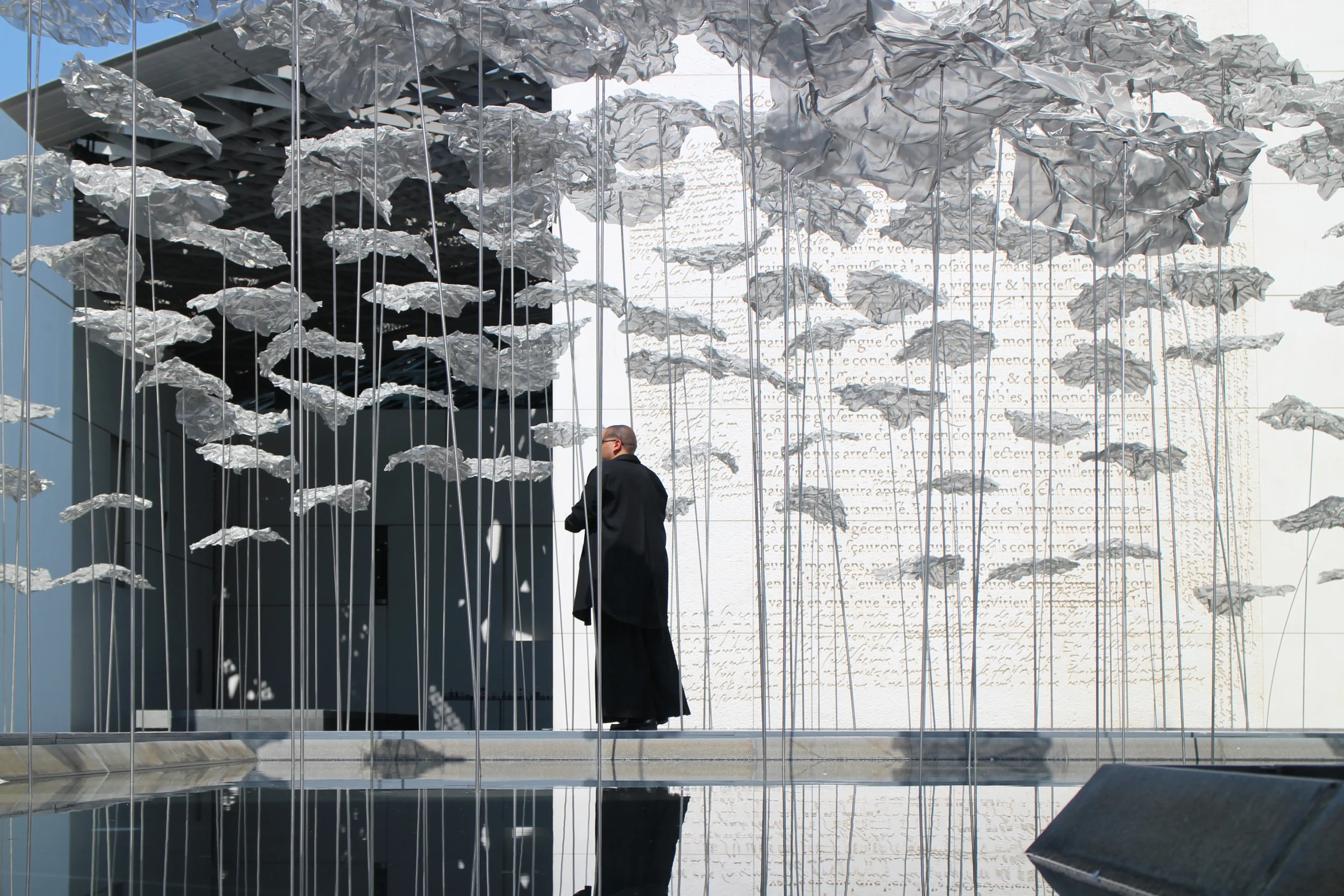 YOKOMAE et BOUAYAD’s stainless-steel pavilion at Louvre Abu Dhabi