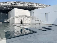 YOKOMAE et BOUAYAD’s stainless-steel pavilion at Louvre Abu Dhabi