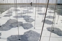 YOKOMAE et BOUAYAD’s stainless-steel pavilion at Louvre Abu Dhabi