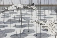 YOKOMAE et BOUAYAD’s stainless-steel pavilion at Louvre Abu Dhabi