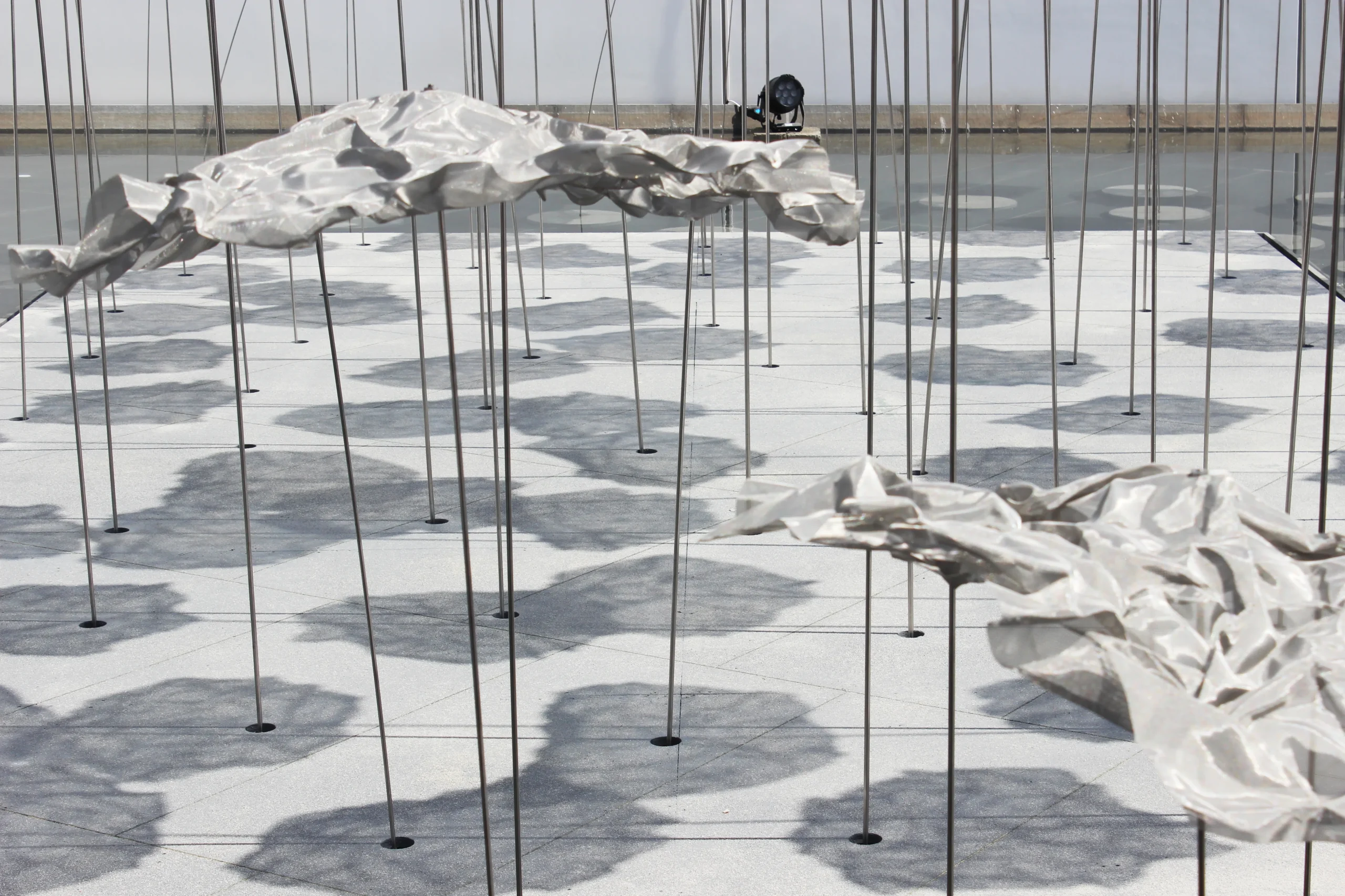 YOKOMAE et BOUAYAD’s stainless-steel pavilion at Louvre Abu Dhabi