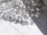 YOKOMAE et BOUAYAD’s stainless-steel pavilion at Louvre Abu Dhabi