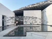 YOKOMAE et BOUAYAD’s stainless-steel pavilion at Louvre Abu Dhabi
