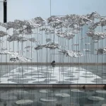 YOKOMAE et BOUAYAD’s stainless-steel pavilion at Louvre Abu Dhabi