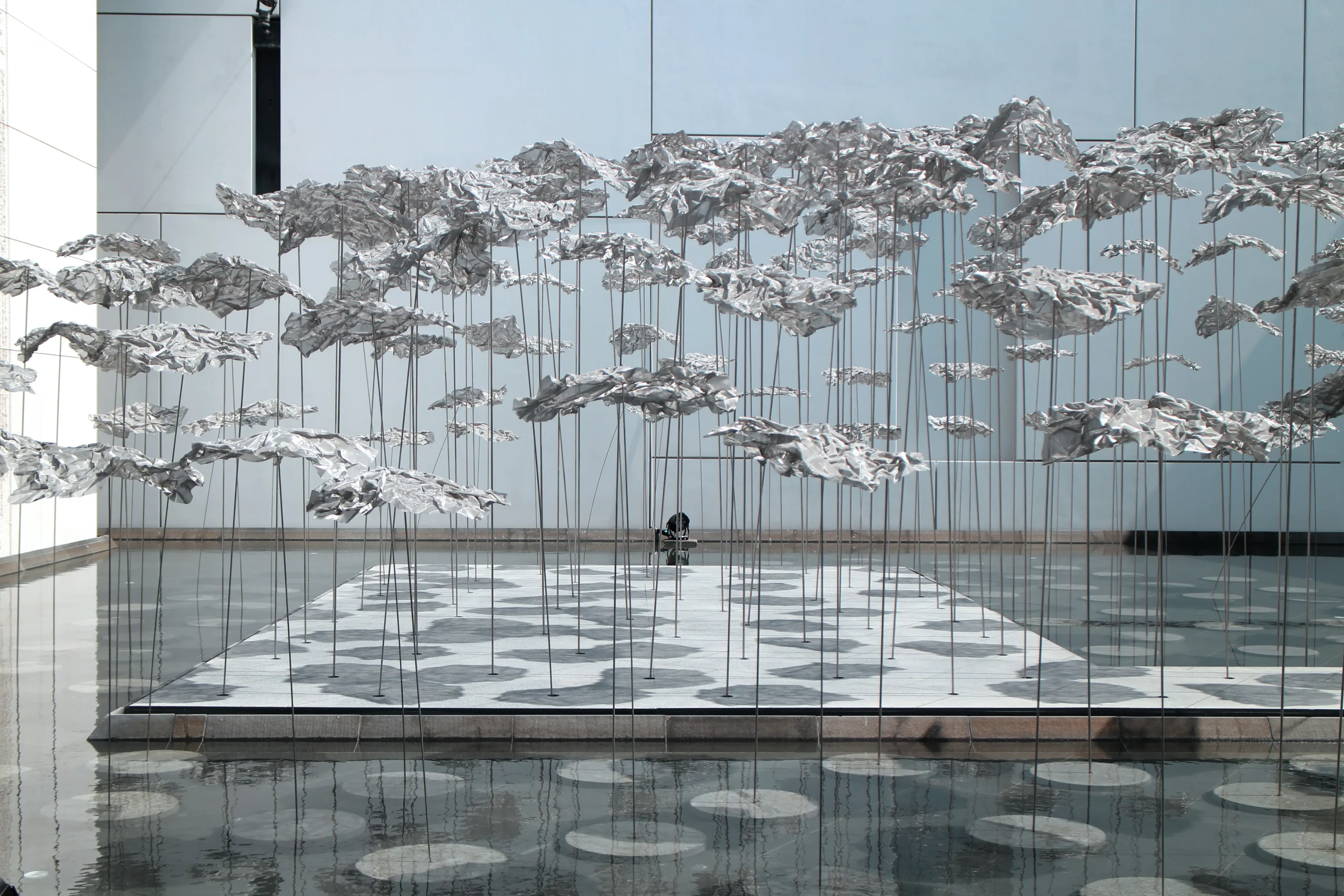 YOKOMAE et BOUAYAD’s stainless-steel pavilion at Louvre Abu Dhabi