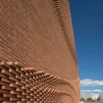 Rewriting Brick in Contemporary Architecture with Geometry, Craft, and Climate Intelligence