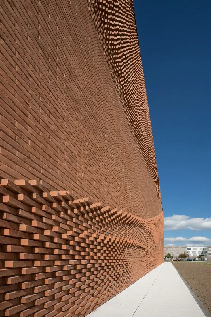 Rewriting Brick in Contemporary Architecture with Geometry, Craft, and Climate Intelligence