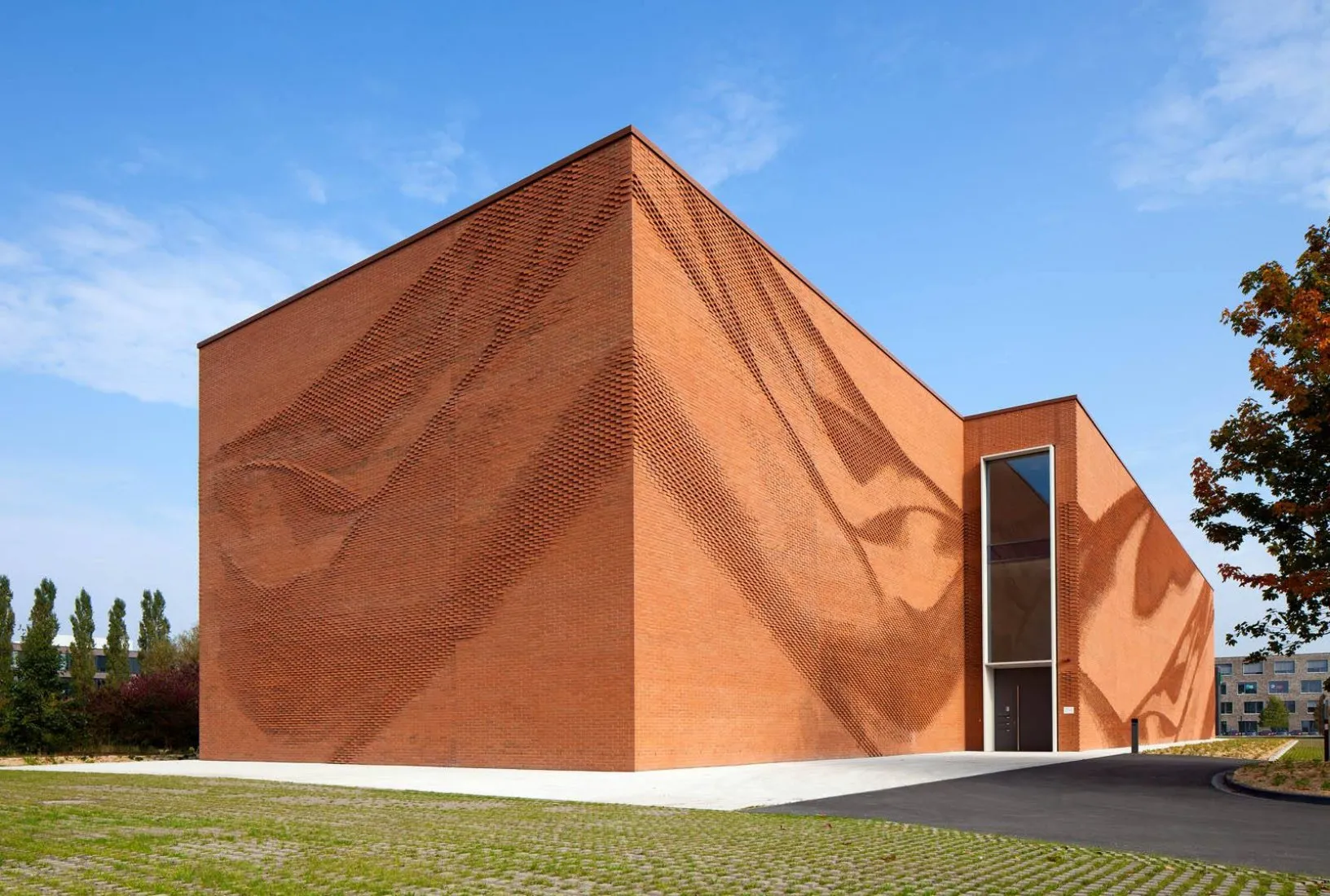Rewriting Brick in Contemporary Architecture with Geometry, Craft, and Climate Intelligence