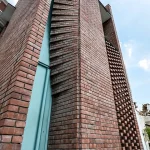 Rewriting Brick in Contemporary Architecture with Geometry, Craft, and Climate Intelligence