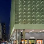 Luxury Retail Architecture Defined by Fluid Façades and Experiential Flagship Interiors
