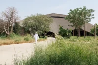 Low-Rise Sculptural Architecture Blends Landscape, Vernacular Form, and Climate-Driven Design