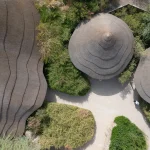 Low-Rise Sculptural Architecture Blends Landscape, Vernacular Form, and Climate-Driven Design