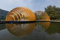 Arched Bamboo-Inspired Pavilion by H&P Architects Rises in Hanoi