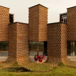 Rewriting Brick in Contemporary Architecture with Geometry, Craft, and Climate Intelligence