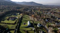 Yaw House by KWK Promes: A Rotating Mountain Home Embedded Into the Beskid Landscape