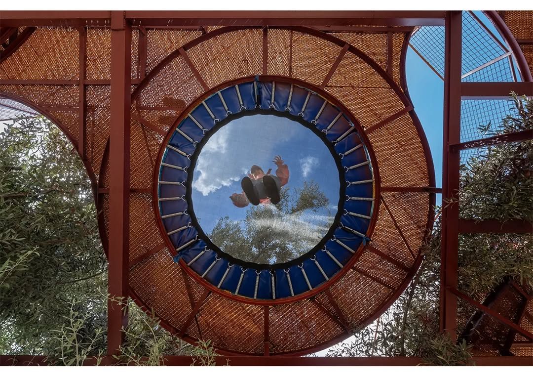 ZAV Architects’ Bright Red and Yellow Playground Cuts Through Iran’s Olive Groves 8 Cheshm Cheran Bazi Playground by ZAV Architects