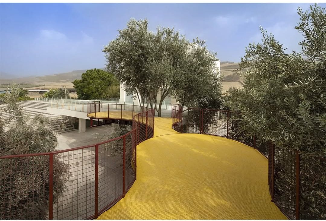 ZAV Architects’ Bright Red and Yellow Playground Cuts Through Iran’s Olive Groves 9 Cheshm Cheran Bazi Playground by ZAV Architects