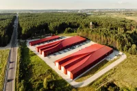Aranchii Architects Designs a Modular Logistics Hub with Red Sculptural Roofs
